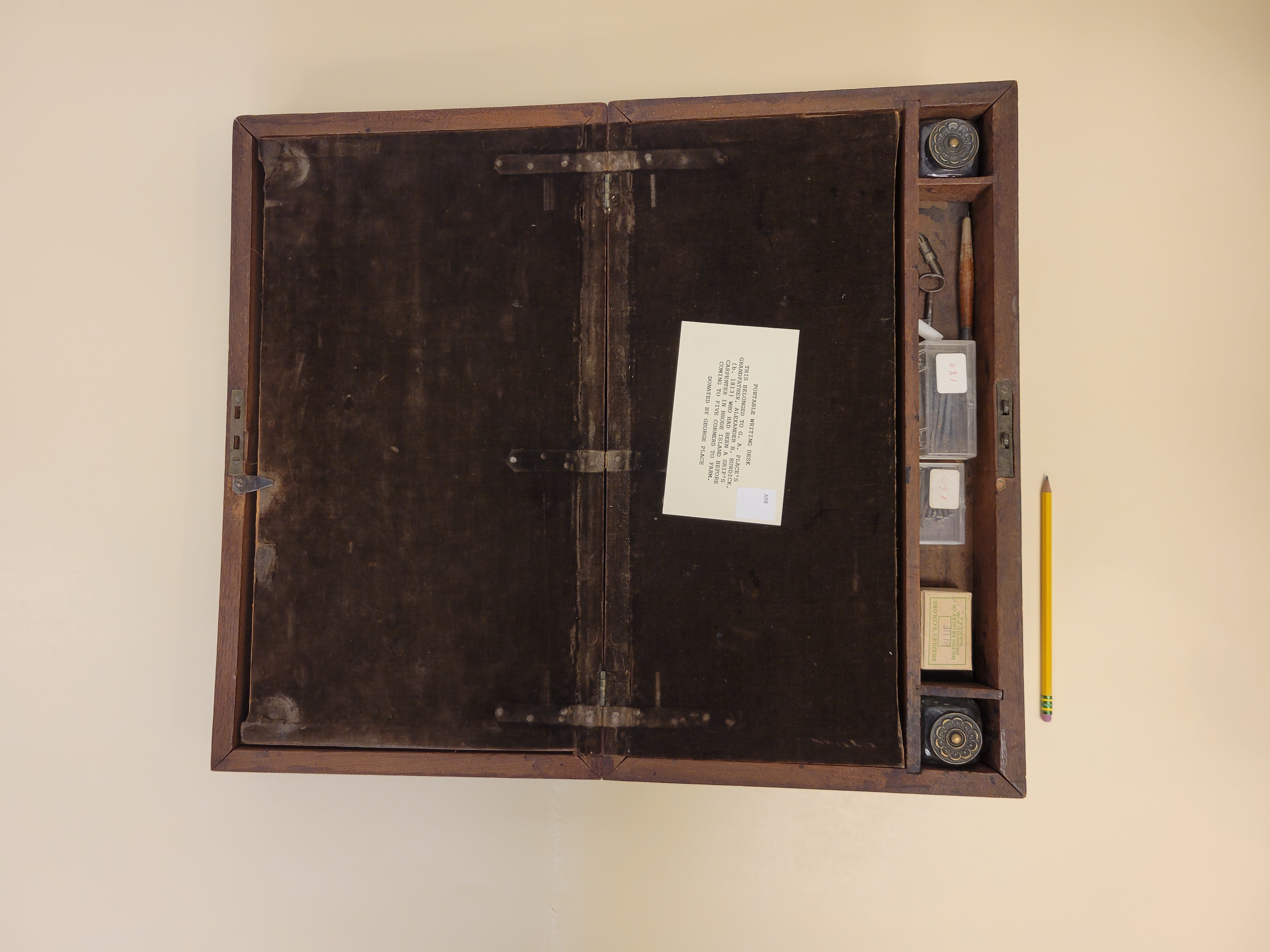 Image of an early portable travel desk opened up